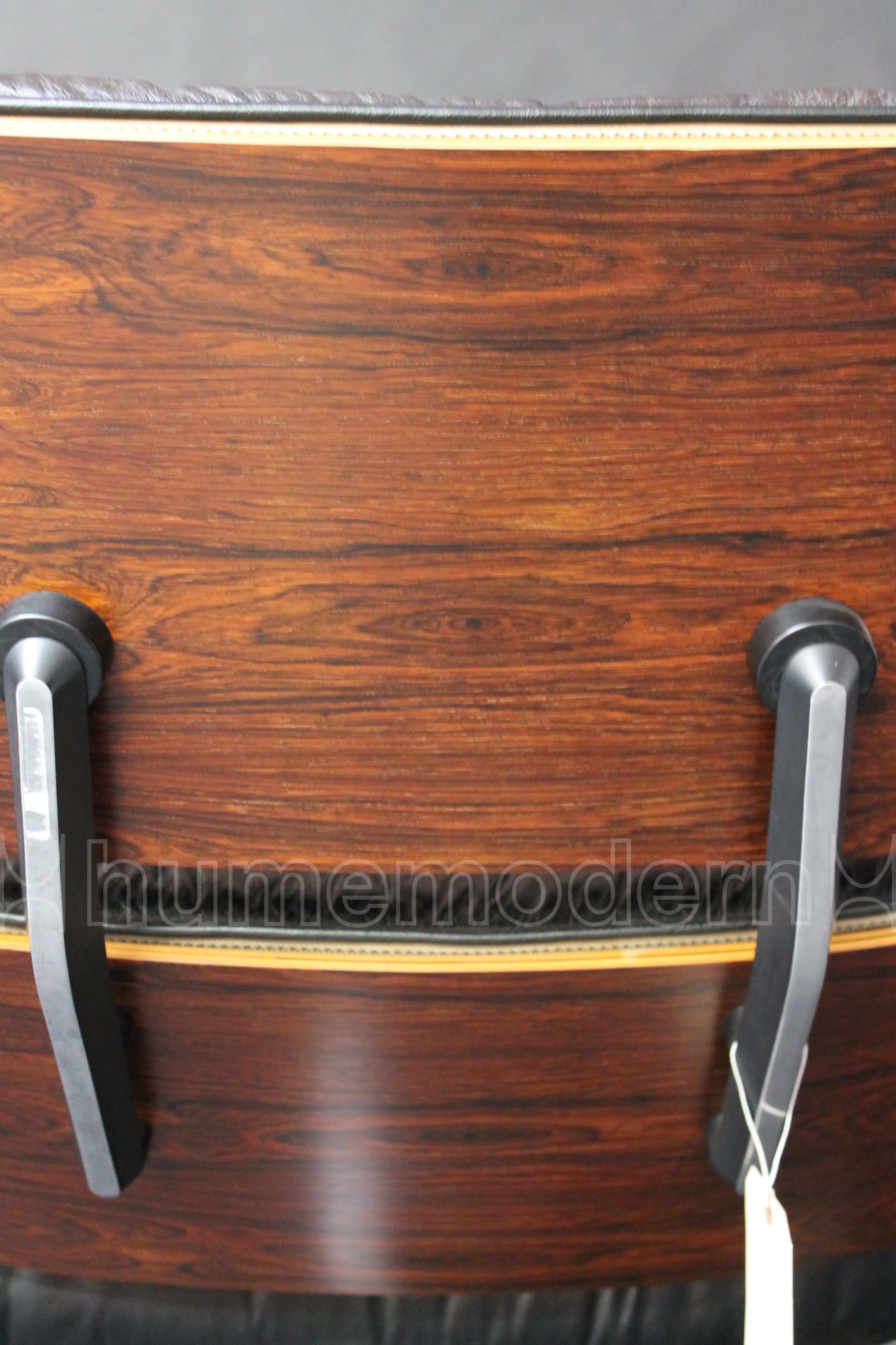 photo of close up back of black leather Classic Eames Lounge Chair ES670 - ES671 #47