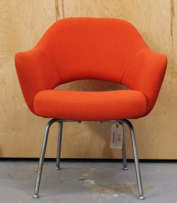 photo of front of vintage orange fabric chair with metal legs