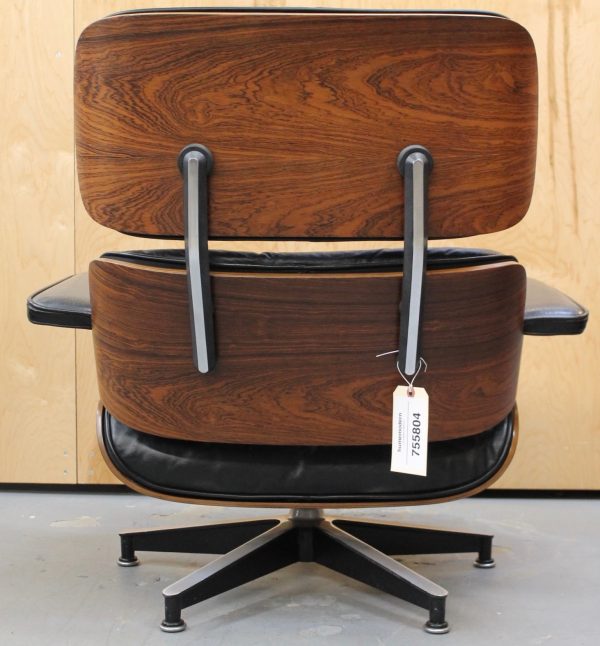 photo of back of rare Eames black leather and rosewood lounge chair