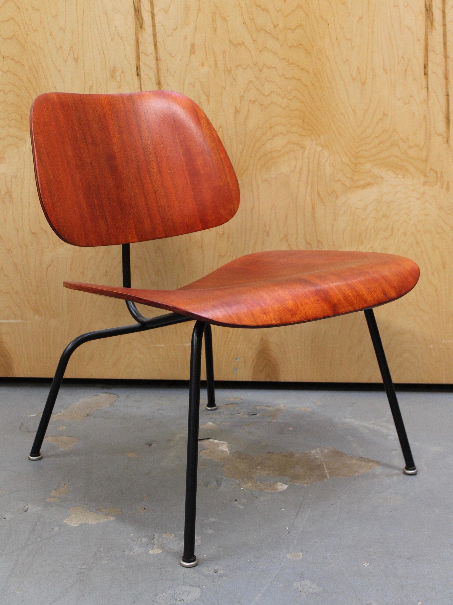 Vintage Eames Red LCM Chair vintage wood and metal chair photo