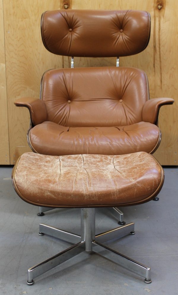 photo of front of distressed brown leather Plycraft lounge chair and ottoman