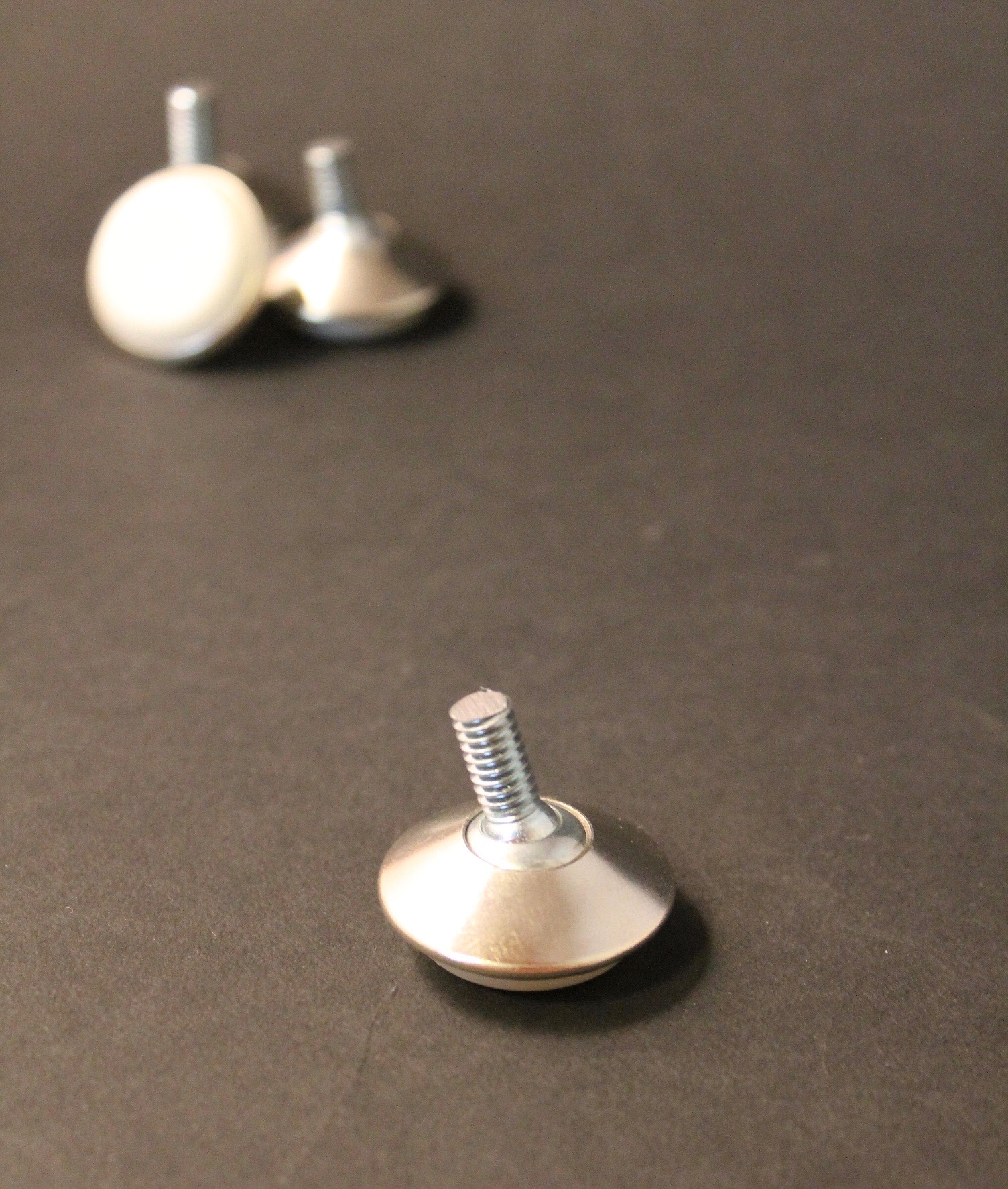 photo of threaded floor glide for knoll and saarinen womb chair