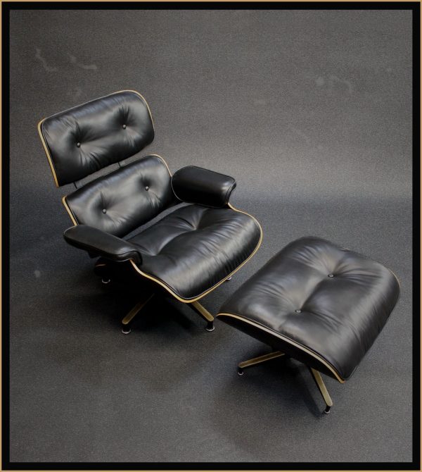 photo of vintage black leather lounge chair and ottoman