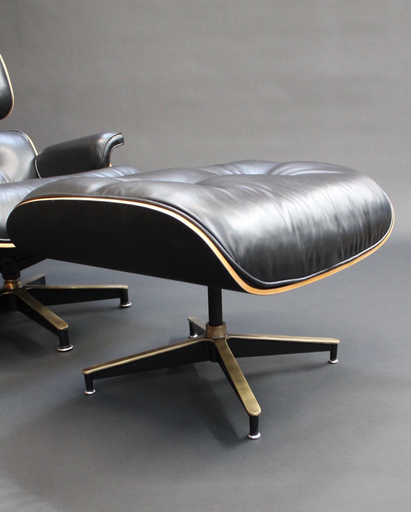 black leather Eames Ottoman